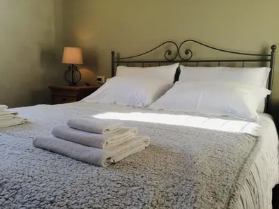 Letto o letti in una camera di Locanda del Sale Affittacamere