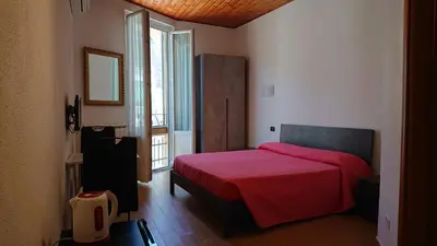 Letto o letti in una camera di Affittacamere Marco