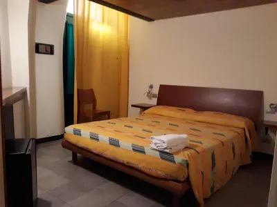 Letto o letti in una camera di Affittacamere Marco