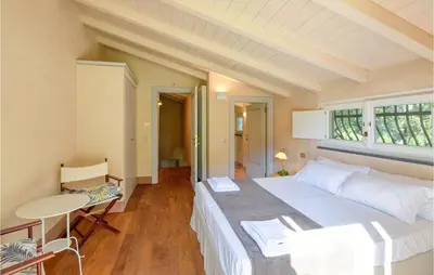 Letto o letti in una camera di S Rocco Dimora Tra Ulivi E M