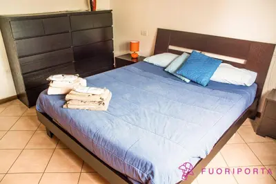 Letto o letti in una camera di FuoriPorta Affitti Brevi - casa vacanze da Nico
