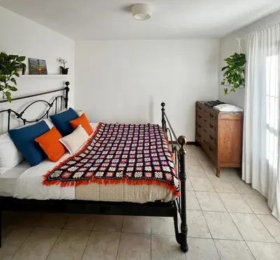 Letto o letti in una camera di EVELYN'S HOME - Giardino&BBQ