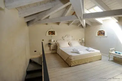 Letto o letti in una camera di Relais La Colombara Spa & Wellness