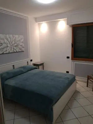 Letto o letti in una camera di FUORI PORTA NUOVA