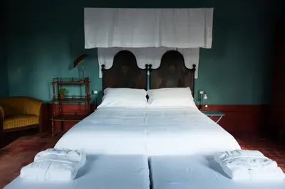 Letto o letti in una camera di Corte Mantovanella