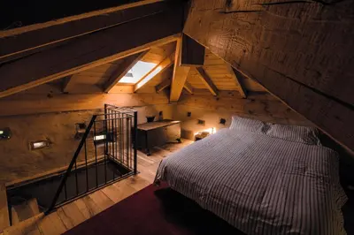Letto o letti in una camera di Tower house Gombola