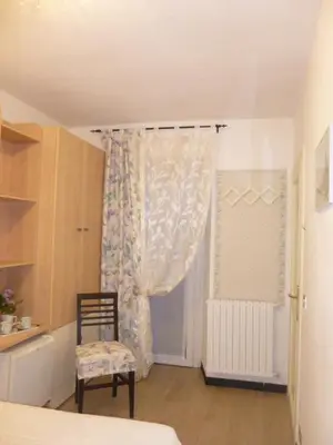 Letto o letti in una camera di Affittacamere Monica