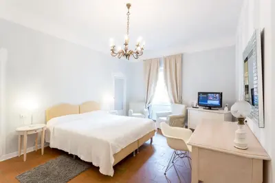 Letto o letti in una camera di Palazzo Dalla Rosa Prati