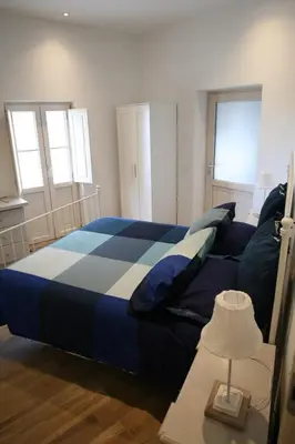 Letto o letti in una camera di B&B Cà di Bollo