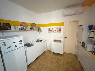 Cucina o angolo cottura di Basuetta Apt in historIcal center with AC