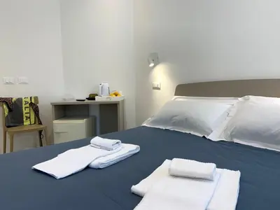 Letto o letti in una camera di Affittacamere Sapore di Mare