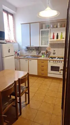 Cucina o angolo cottura di Stanza in appartamento condiviso nel centro storico di Parma