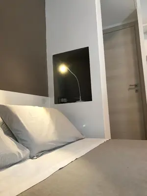 Letto o letti in una camera di La Maggiolina camere La Spezia