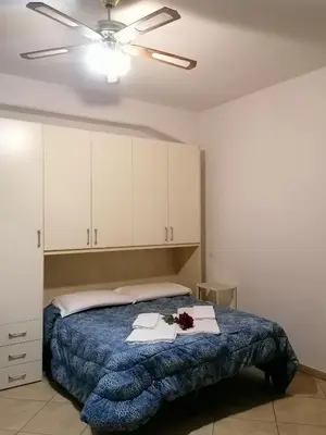 Letto o letti in una camera di Villa Glori affitto camere monolocali