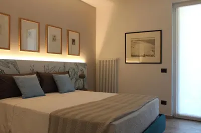 Letto o letti in una camera di Calma di vento