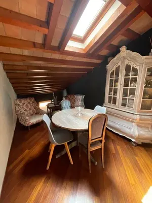 Area soggiorno di Le Camere di Bsuites Affittacamere