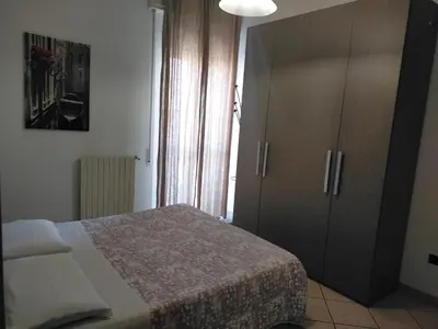 Letto o letti in una camera di casa vacanza Regina