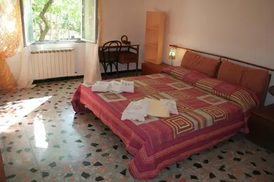 Letto o letti in una camera di Centrale nel verde int 1