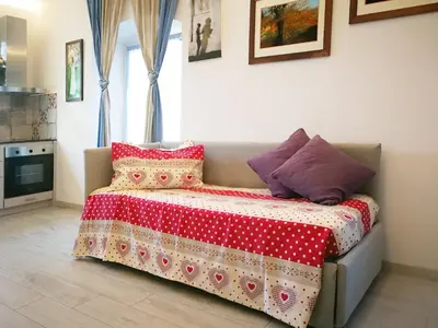 Letto o letti in una camera di L'Arte al mare