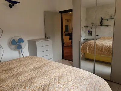 Letto o letti in una camera di SESTRI Villa Vignolo with POOL