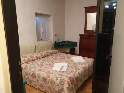 Letto o letti in una camera di SESTRI Villa Vignolo with POOL