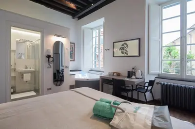 Letto o letti in una camera di Piccolo Principe Affittacamere