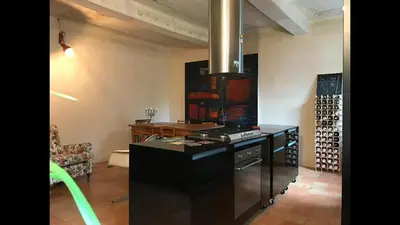 Cucina o angolo cottura di Casa luminosa con giardino in centro storico