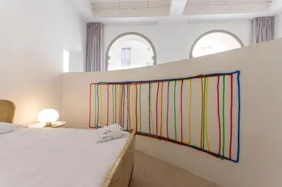 Letto o letti in una camera di PALAZZO BECCAGUTTI CAVRIANI - Gallery Suite e Frescoes Suite