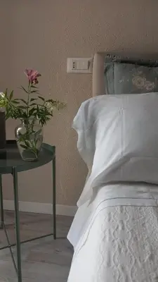 Letto o letti in una camera di Corte castella