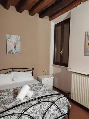 Letto o letti in una camera di Carducci 49