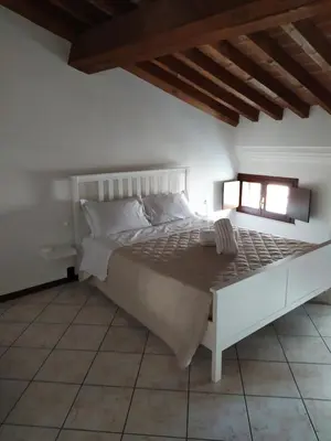 Letto o letti in una camera di Carducci 49