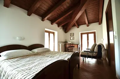 Letto o letti in una camera di Agriturismo Ca' del Sartu