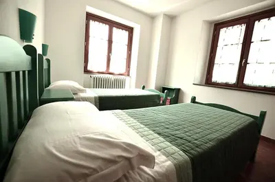 Letto o letti in una camera di Agriturismo Ca' del Sartu