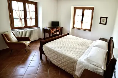 Letto o letti in una camera di Agriturismo Ca' del Sartu