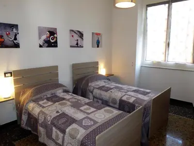 Letto o letti in una camera di La Casa Del Merlo by Holiday World