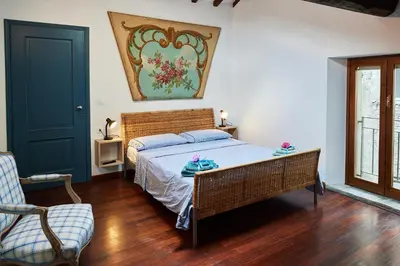 Letto o letti in una camera di La Casa di Giulia-Family Apartment