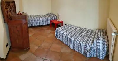 Letto o letti in una camera di Antica Postumia