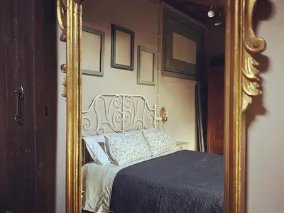 Letto o letti in una camera di B&B Podere Merlo