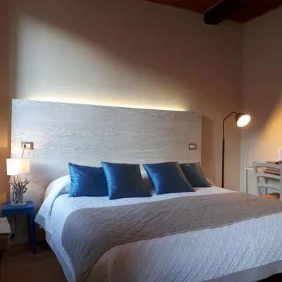 Letto o letti in una camera di Bellambra