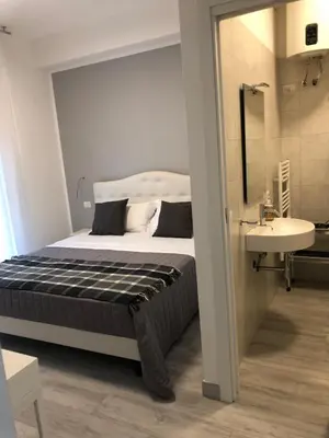 Letto o letti in una camera di Nannare' Rooms