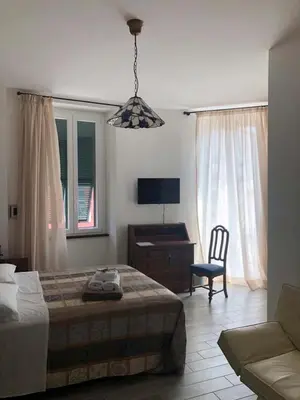 Letto o letti in una camera di Alla Porta Di Sotto B&B