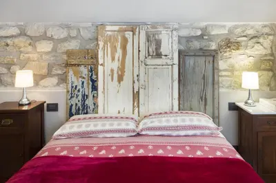Letto o letti in una camera di Alla Porta Di Sotto B&B