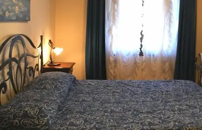 Letto o letti in una camera di B&B La Ca Vecia