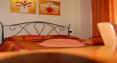Letto o letti in una camera di B&B La Ca Vecia