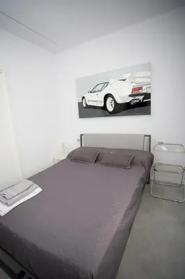 Letto o letti in una camera di Casa Elisa Dimora Urbana
