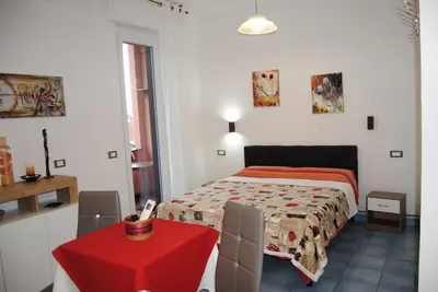 Letto o letti in una camera di Villa Caribe affittacamere