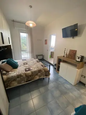 Letto o letti in una camera di Villa Caribe affittacamere