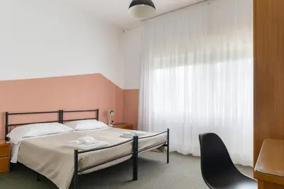 Letto o letti in una camera di UniHo Hostel