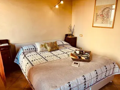 Letto o letti in una camera di Residenza dei Mille