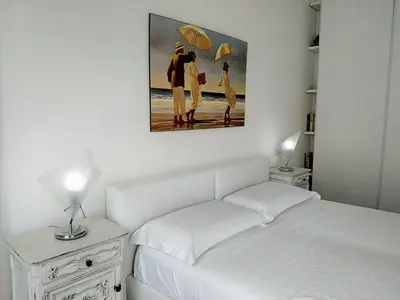 Letto o letti in una camera di CASAVIVA - Casa Vacanze Betti a Rapallo con terrazza